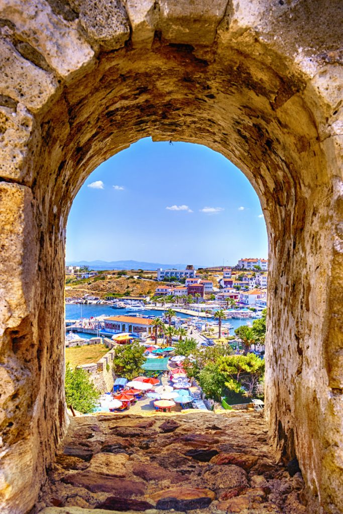 Bozcaada, Turkey, View of the port, fortress, Aegean Sea, promenade, shops and restaurants.
